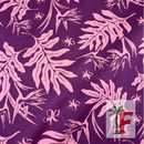 Close-up view of Coastal Canopy fabric featuring an intricate botanical pattern of tropical palm leaves, monstera leaves, and hibiscus flowers in light pink over a deep purple background.