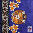 A close-up of a patterned textile featuring a purple background with dark blue tropical leaf motifs, white and orange plumeria flowers, a central multicolor coat of arms, and a vertical geometric border on the left.