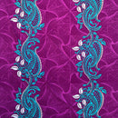 Light Blue and white paisley pattern on a purple background