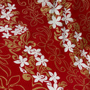 Red fabric with gold and white floral patterns